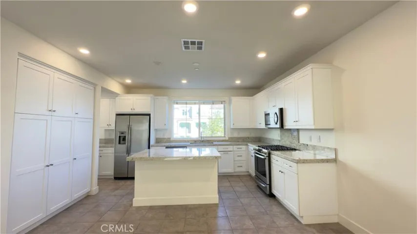 Modern Kitchen with island and lots of cabinets