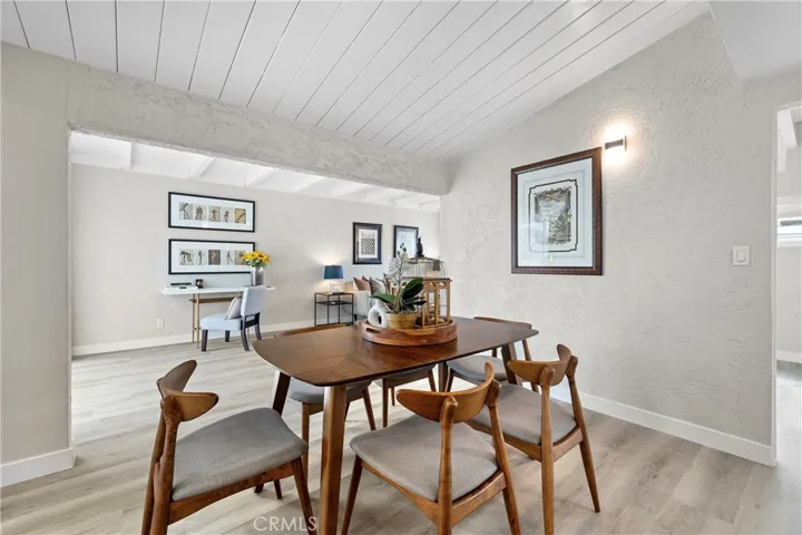 Dining room is open to the kitchen and living areas.