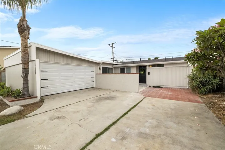 2 car garage, with an extra wide driveway.