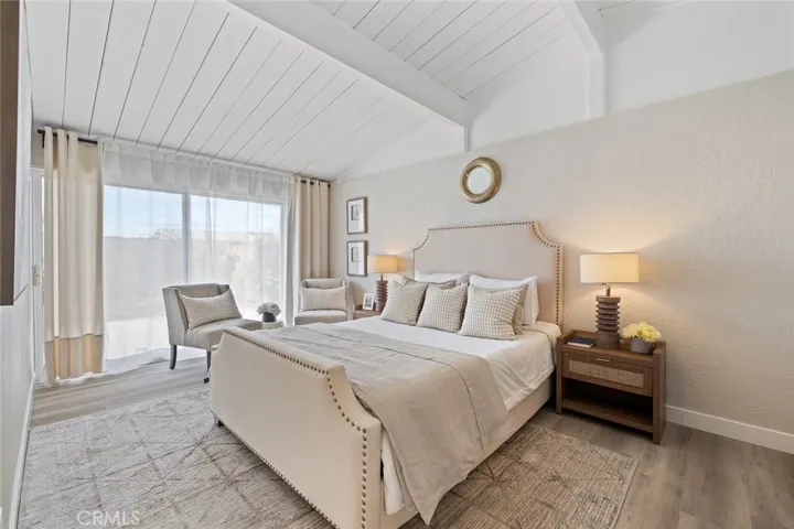 Primary bedroom Suite with a sliding door to the backyard.