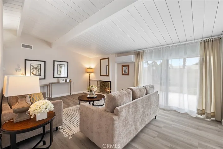 Beamed ceilings throughout the home.