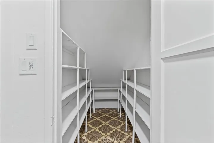 Pantry with access from garage