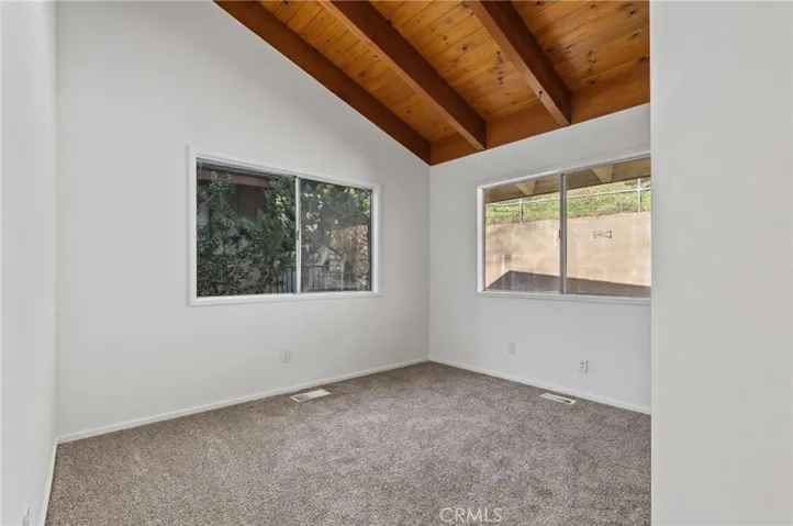 Upper level bedroom facing rear