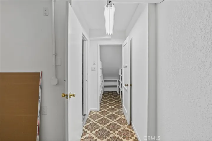 Hall from garage to pantry and to the laundry and workshop/storage