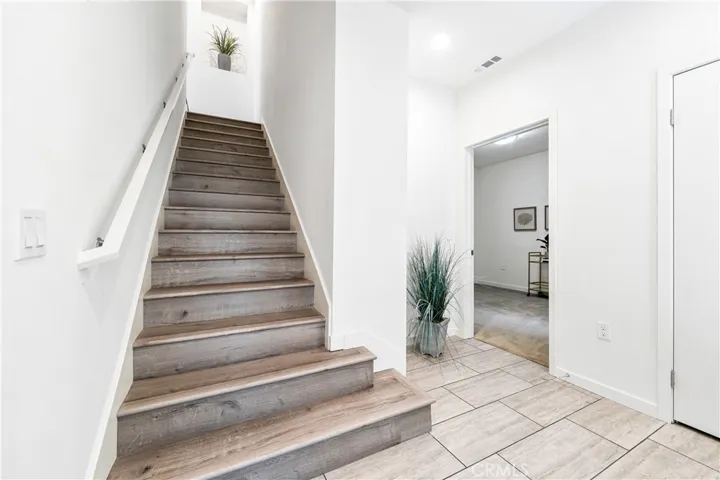 Stairs to Level two and Bedroom entrance