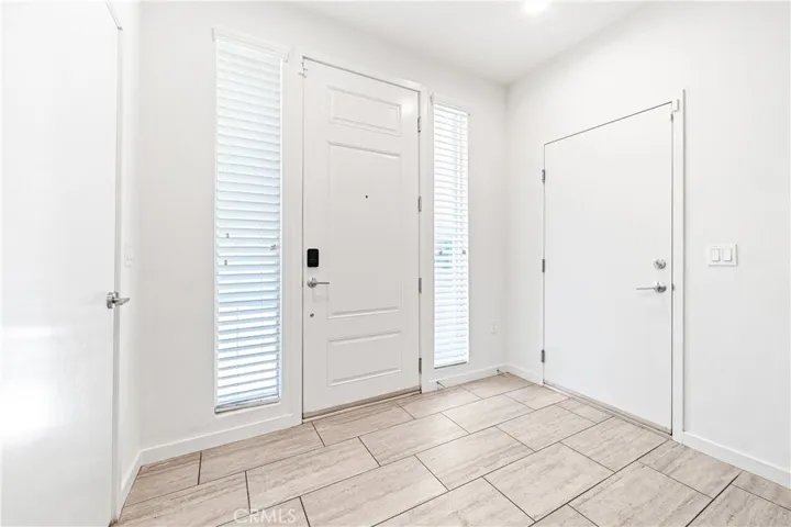 Front door and first level bedroom suite