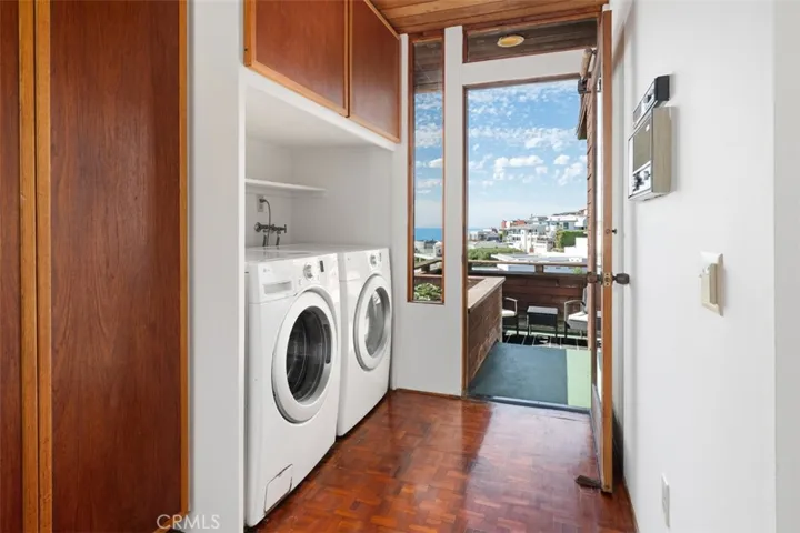 Laundry with patio and herb planter