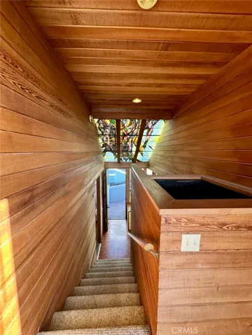 Staircase to upper level den
