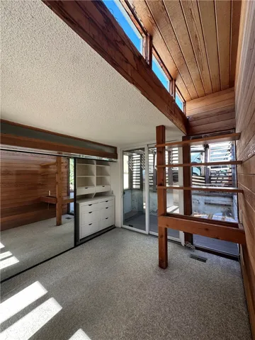 Bedroom 3 with patio and built in desk