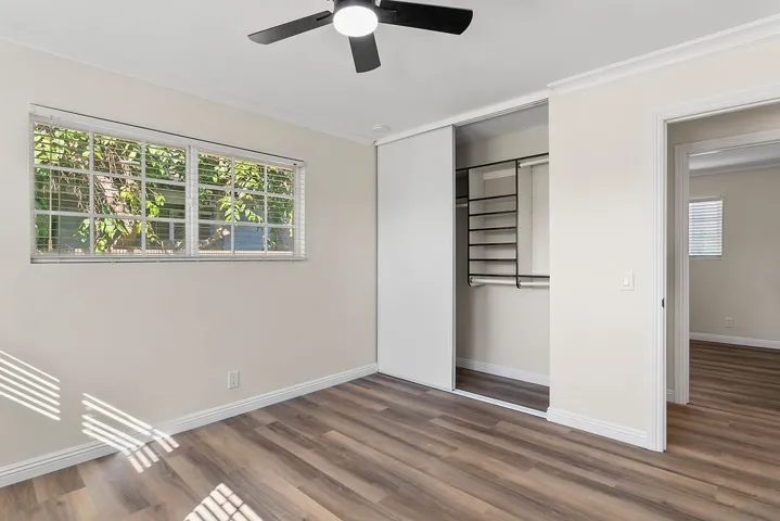 Primary Bedroom closet with shelves
