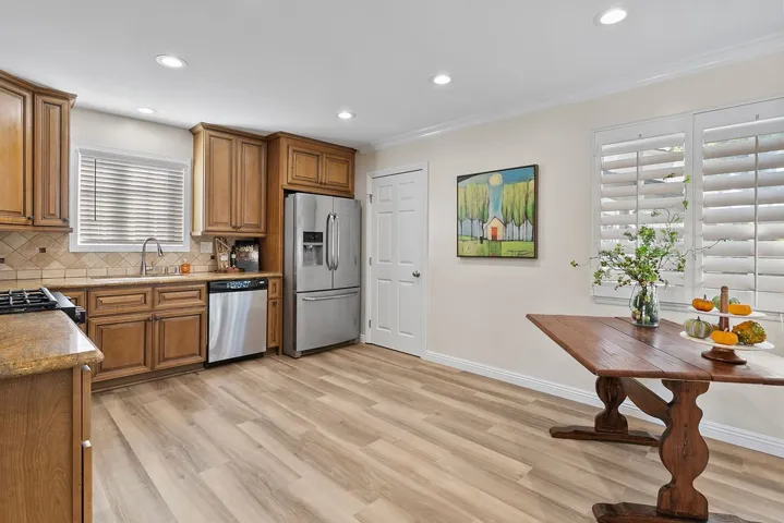 Large eat in kitchen with recessed lighting