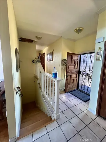 Entry and stairs to garage