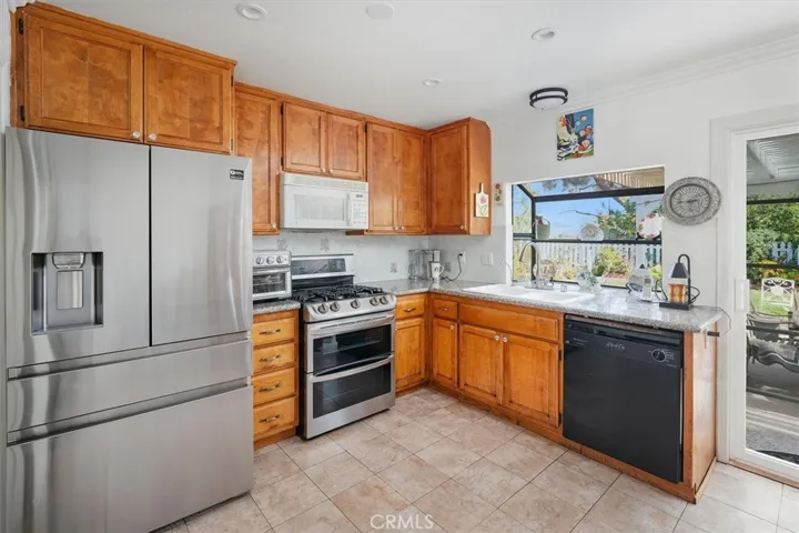 Kitchen with granite countertops and S/S double oven.  A new S/S dishwasher will be installed soon.
