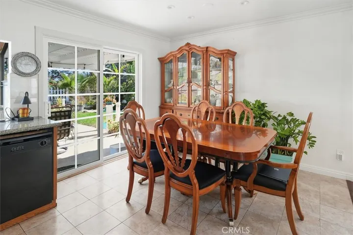 Dining area with a newer glass door to the backyard