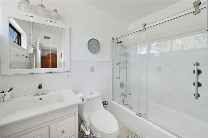 En-suite bathroom has upgraded vanity and fixture