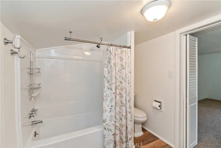 Bathtub & Shower (Primary Bedroom)