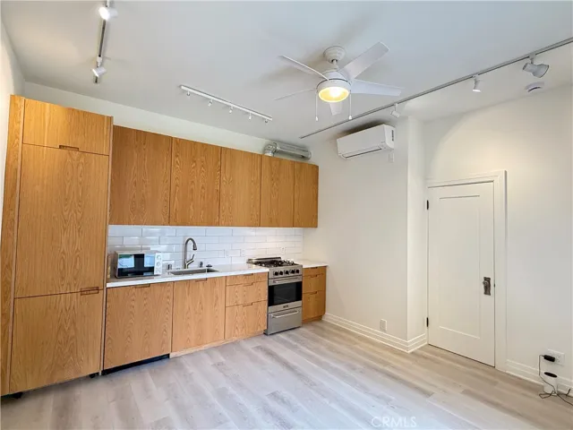 kitchen view of door to bedroom