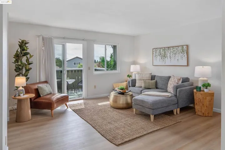 Living area with light wood finished floors