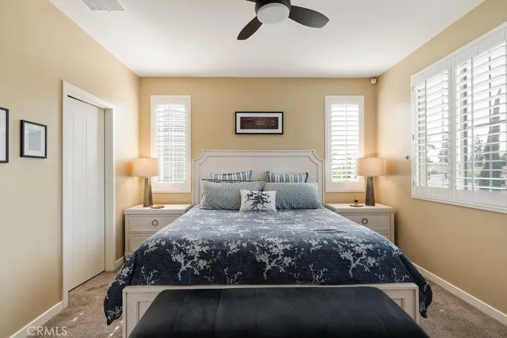 Primary bedroom easily fits king bed