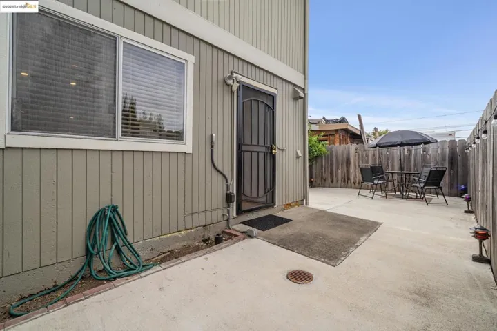 Property entrance featuring a patio area