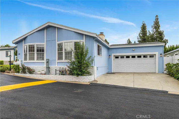 Crestmont Mobile Estates  -  Beautiful, updated, with rare two-car attached garage, 3 Bedroom, 2 Full Bath, 1,400 Sq Ft Living Space. Call this home!