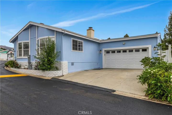 Crestmont Mobile Estates  -  Beautiful, updated, with rare two-car attached garage, 3 Bedroom, 2 Full Bath, 1,400 Sq Ft Living Space. Call this home!