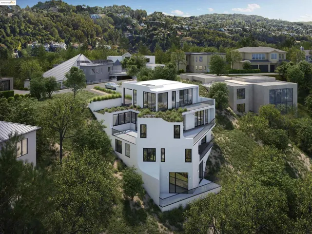 Aerial view of residential area with a tree filled landscape