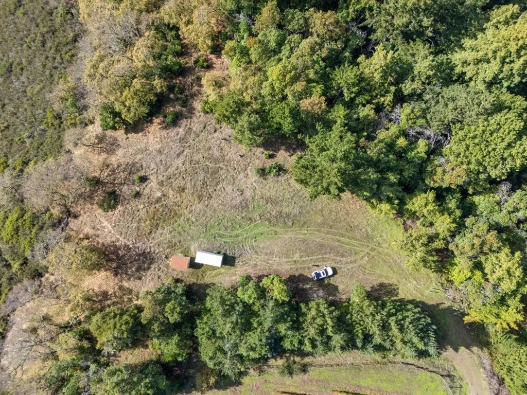 Birds eye view of flat part of parcel with shed to remain, connex to be removed.