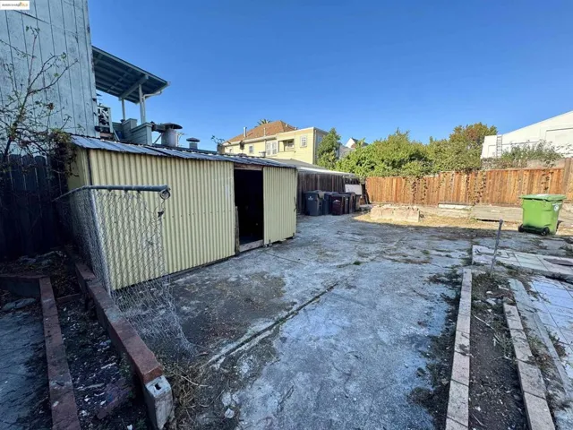 View of outbuilding featuring a fenced backyard