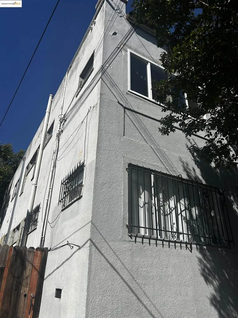 View of property exterior with stucco siding