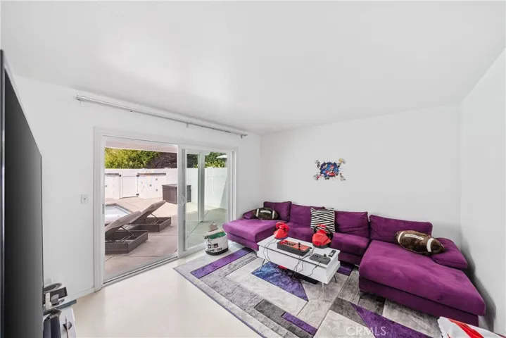 downstairs bedroom with access to backyard