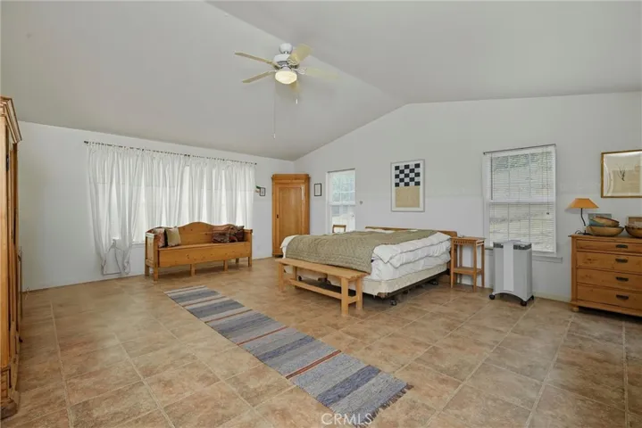 Expansive primary suite with walk in closet.