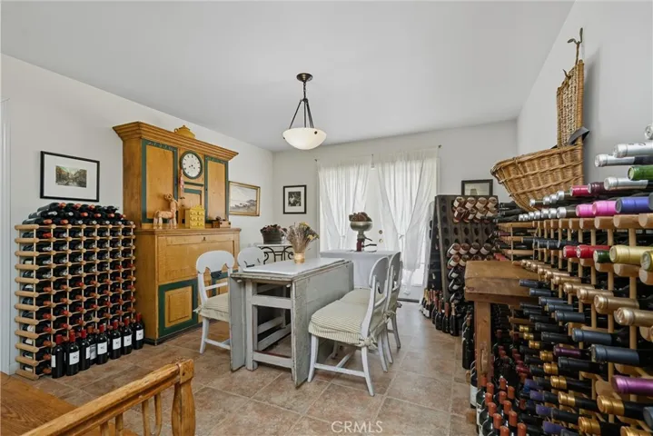 French doors open onto outside deck from dining room.