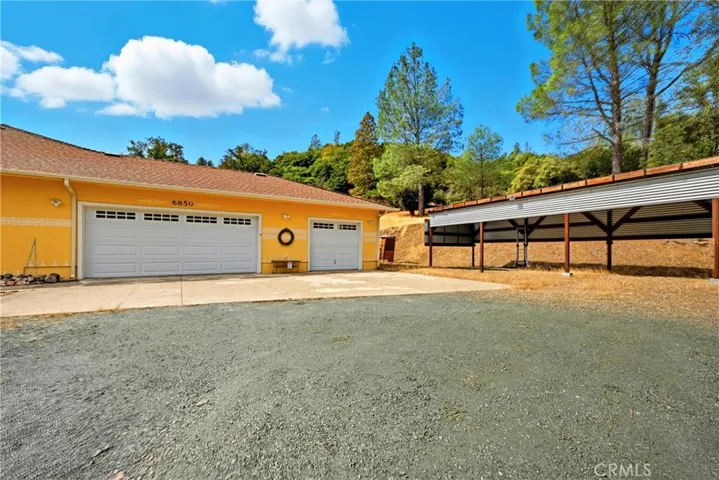 Three car garage and covered parking for all your extras!