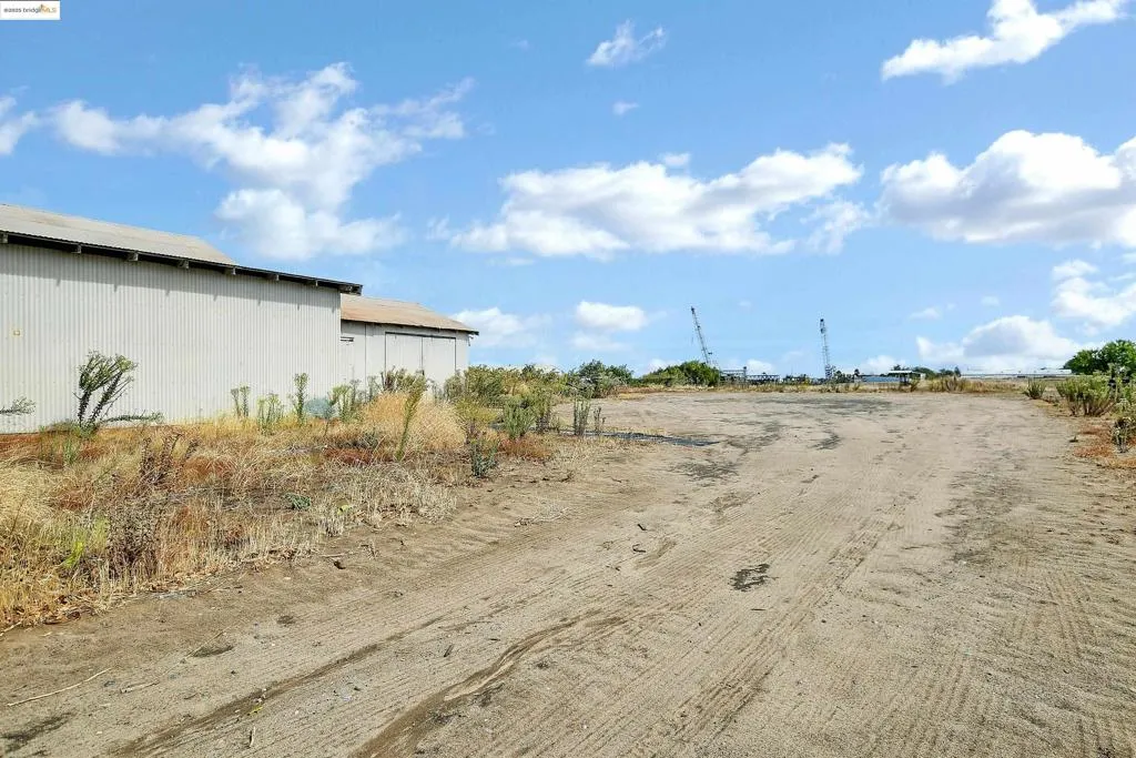 View of dirt / gravel road featuring a rural view