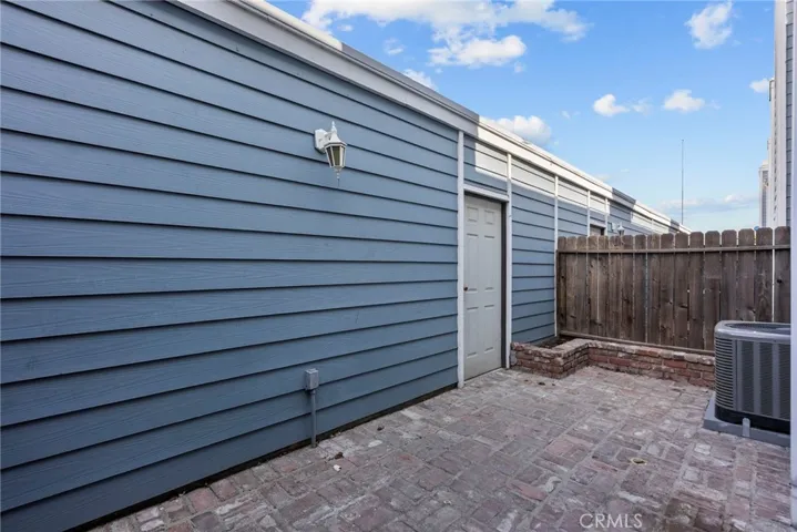 Patio area between Townhouse and garage buildings