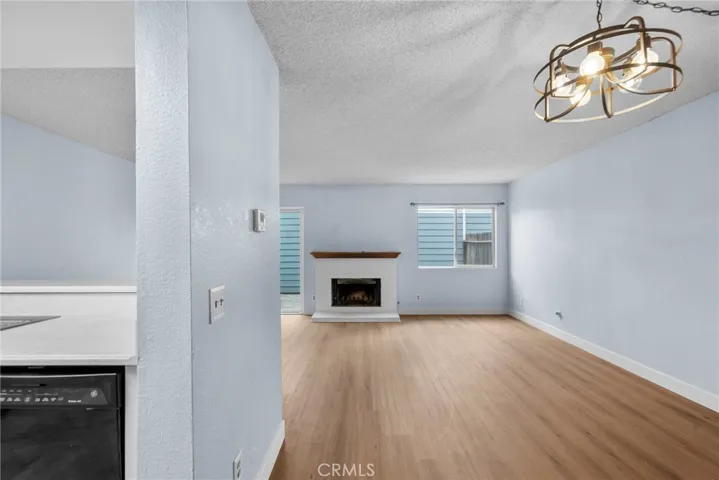 Livingroom Fireplace in view from level 1 hallway