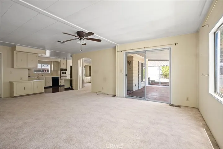 large family room leading to kitchen