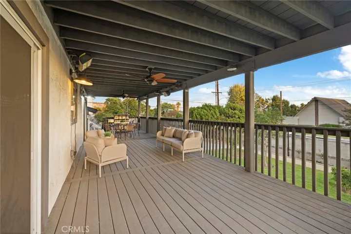 Great covered Terex deck off the dining room with a city light view. Perfect for BBQing and entertaining.