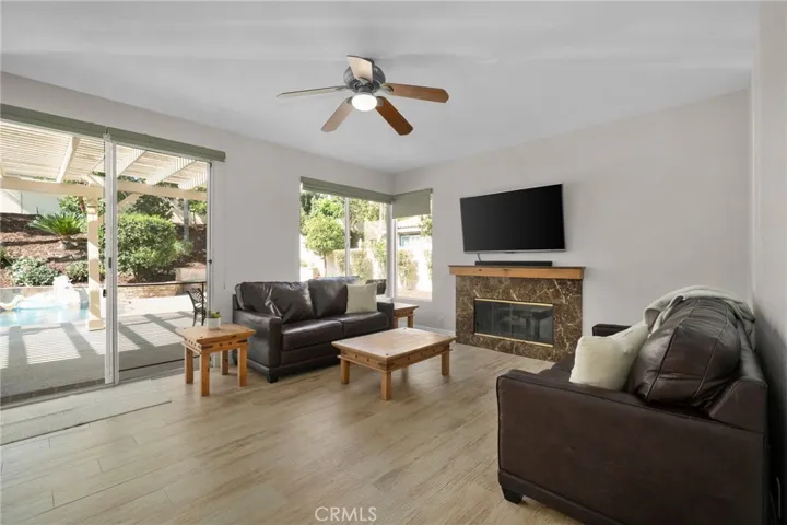 Family room with cozy fireplace.