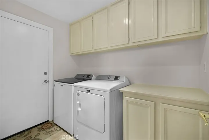 Inside laundry room.
