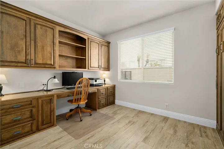 Main floor bedroom with gorgeous wood built-in features.