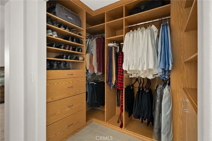 Primary closet with organization system.