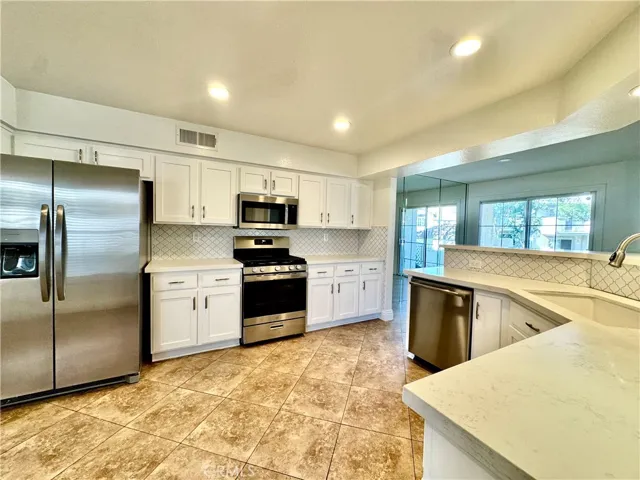 Stainless steal appliances with brand new refrigerator included
