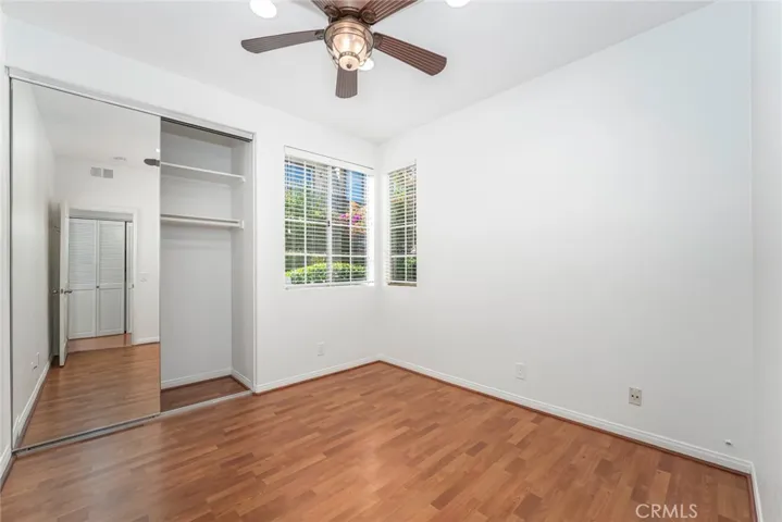 Second bedroom with ceiling fan