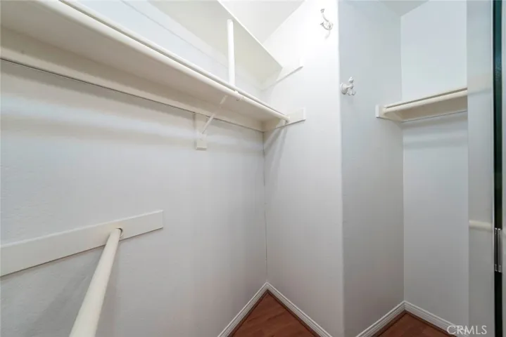 Walk - in closet in master bedroom