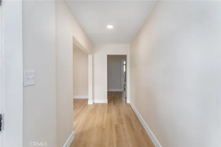 hallway behind entry living toom