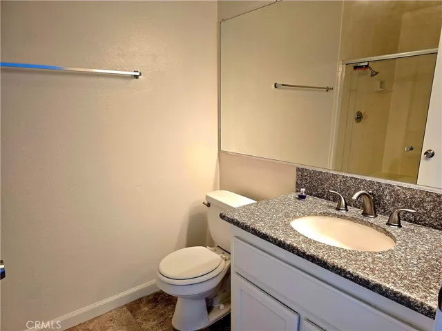 Bathroom with granite counter top