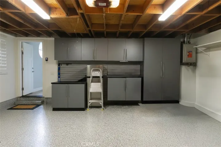 cabinets in finished garage provide more storage space
