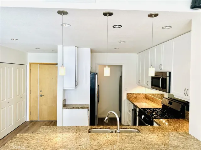 Open kitchen and living area ideal for everyday living and entertaining.